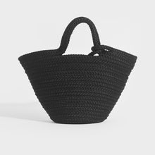 Load image into Gallery viewer, Back view of Balenciaga Ibiza nylon and leather basket bag in black