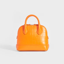 Load image into Gallery viewer, Back view of Balenciaga XXS ville embossed leather tote in orange