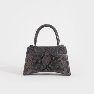 Rear of the BALENCIAGA Small Hourglass Top Handle Snakeskin-Effect Leather Bag in Dark Grey and Black