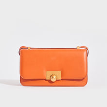 Load image into Gallery viewer, Front view of the BOTTEGA VENETA The Classic Small Leather Shoulder Bag in Orange