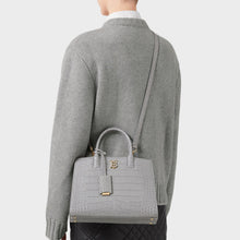 Load image into Gallery viewer, Model wearing the BURBERRY Mini Frances Bag in Cloud Grey Embossed Leather