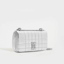 Load image into Gallery viewer, Side view of the BURBERRY Mini Quilted Leather Lola Bag in Metallic Silver