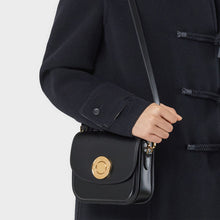 Load image into Gallery viewer, Model wearing the BURBERRY Small Leather Elizabeth Bag in Black