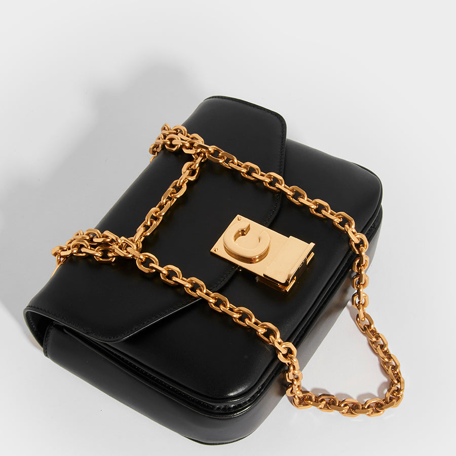 Small black online bag with chain