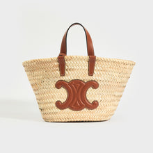 Load image into Gallery viewer, Front of the CELINE Triomphe Teen Panier Basket Bag in Raffia