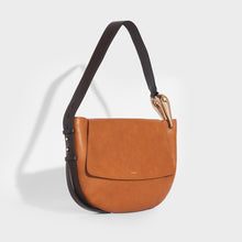 Load image into Gallery viewer, Side of the CHLOÉ Kiss Hobo Shoulder Bag in Tan leather