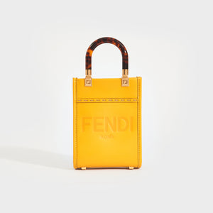 Front of the FENDI Sunshine Mini Shopper Bag in Yellow