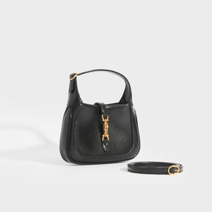 Side view of the GUCCI Jackie 1961 Mini Hobo Bag in Black Leather