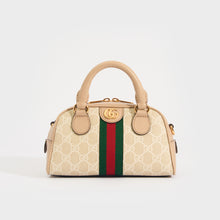 Load image into Gallery viewer, Front view of the GUCCI Ophidia Mini GG Top Handle Bag in Beige and White GG Supreme Canvas
