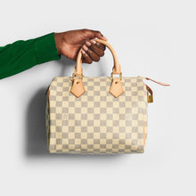 Load image into Gallery viewer, Model holding the LOUIS VUITTON Speedy 25 in Damier Azur Canvas 2012