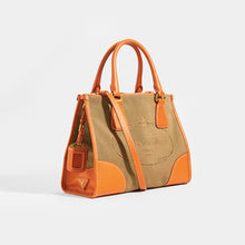Load image into Gallery viewer, Side view of PRADA Vintage Galleria Saffiano Bag in Beige Canvas Leather with strap