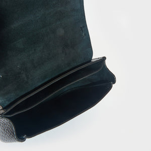 Inside view of the suede lining on the SAINT LAURENT Small Kaia Leather Shoulder Bag in Black