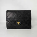 Vintage Timeless Classic Single Flap in Black Lambskin 1994 - 1996