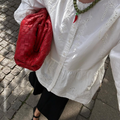 The Pouch Intrecciato Leather Clutch in Red