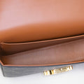 Small Triomphe Claude Shoulder Bag in Brown Canvas