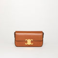 Small Triomphe Claude Shoulder Bag in Brown