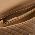 Coco Caviar Top Handle Bag in Beige