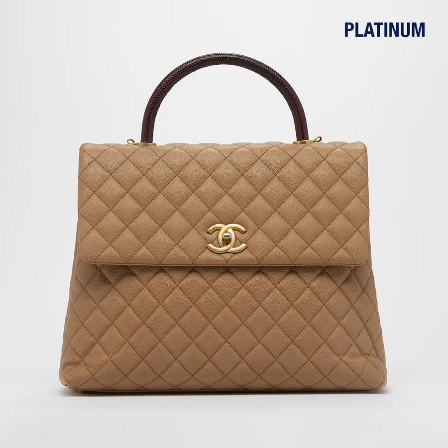 Coco Caviar Top Handle Bag in Beige