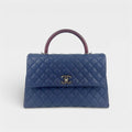 Coco Caviar Top Handle Bag in Navy