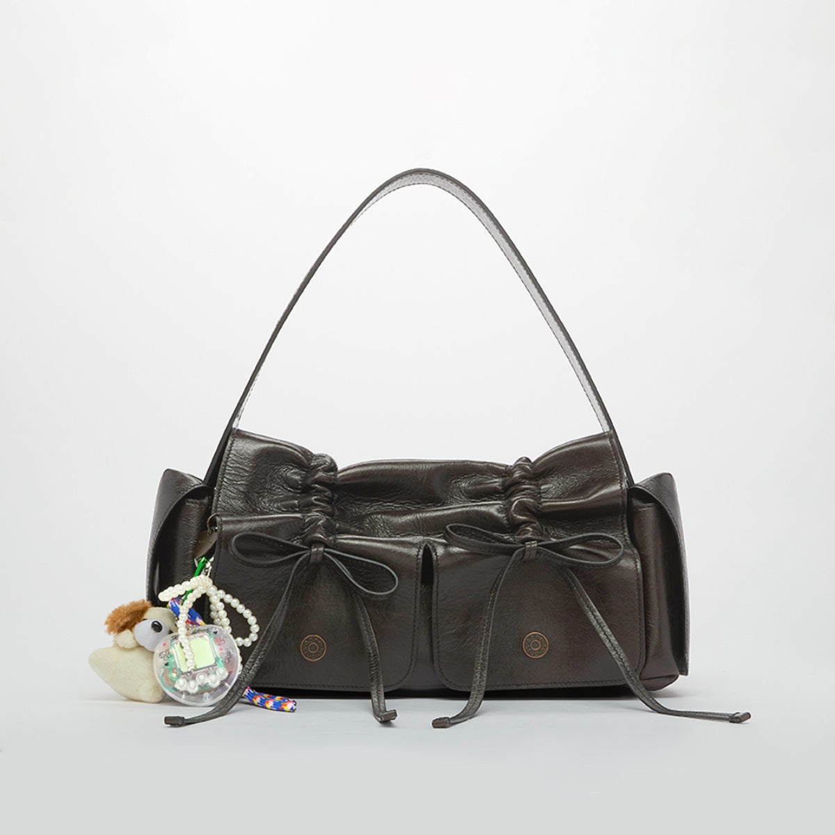 Multi Pocket Bow Bag in Dark Brown with Charms