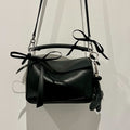 Mini Puzzle Bag in Black Leather