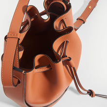 Load image into Gallery viewer, Inside of the LOEWE Balloon Small Bucket Bag in Tan Leather