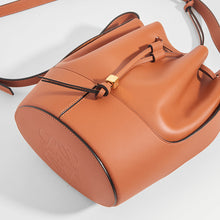 Load image into Gallery viewer, Close up detail of the LOEWE Balloon Small Bucket Bag in Tan Leather