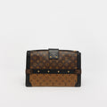 Monogram Reverse Trunk Clutch Bag