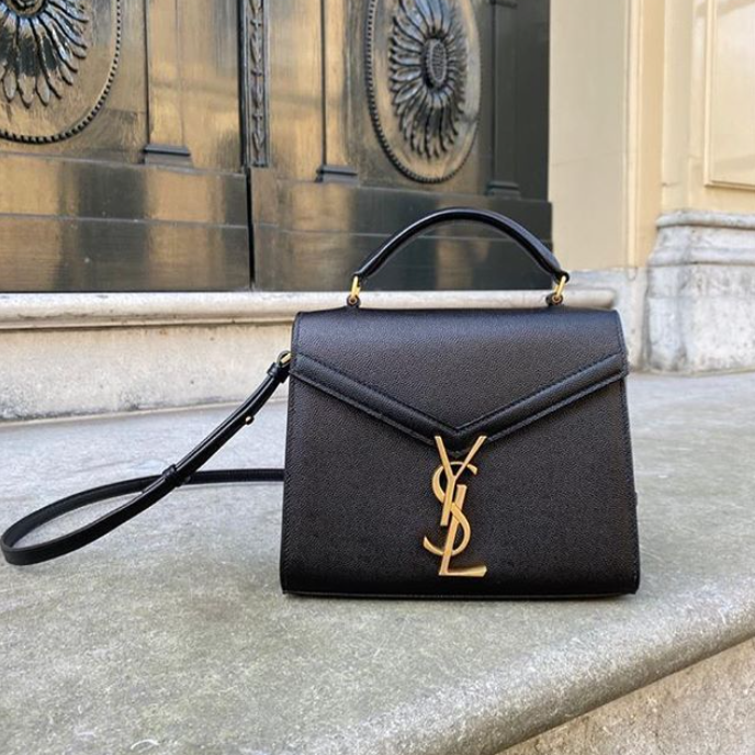 Mini Cassandra Grain De Poudre Embossed Leather Bag in Black