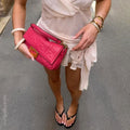 Small Zucca Baguette Bag in Pink Embossed Leather
