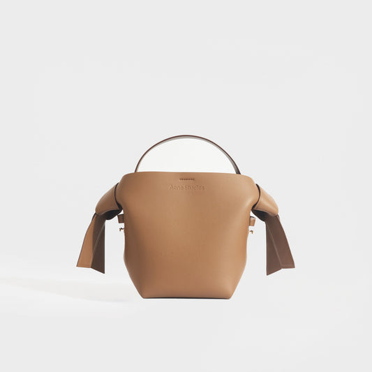 Musubi Mini Knotted Leather Crossbody Bag in Tan