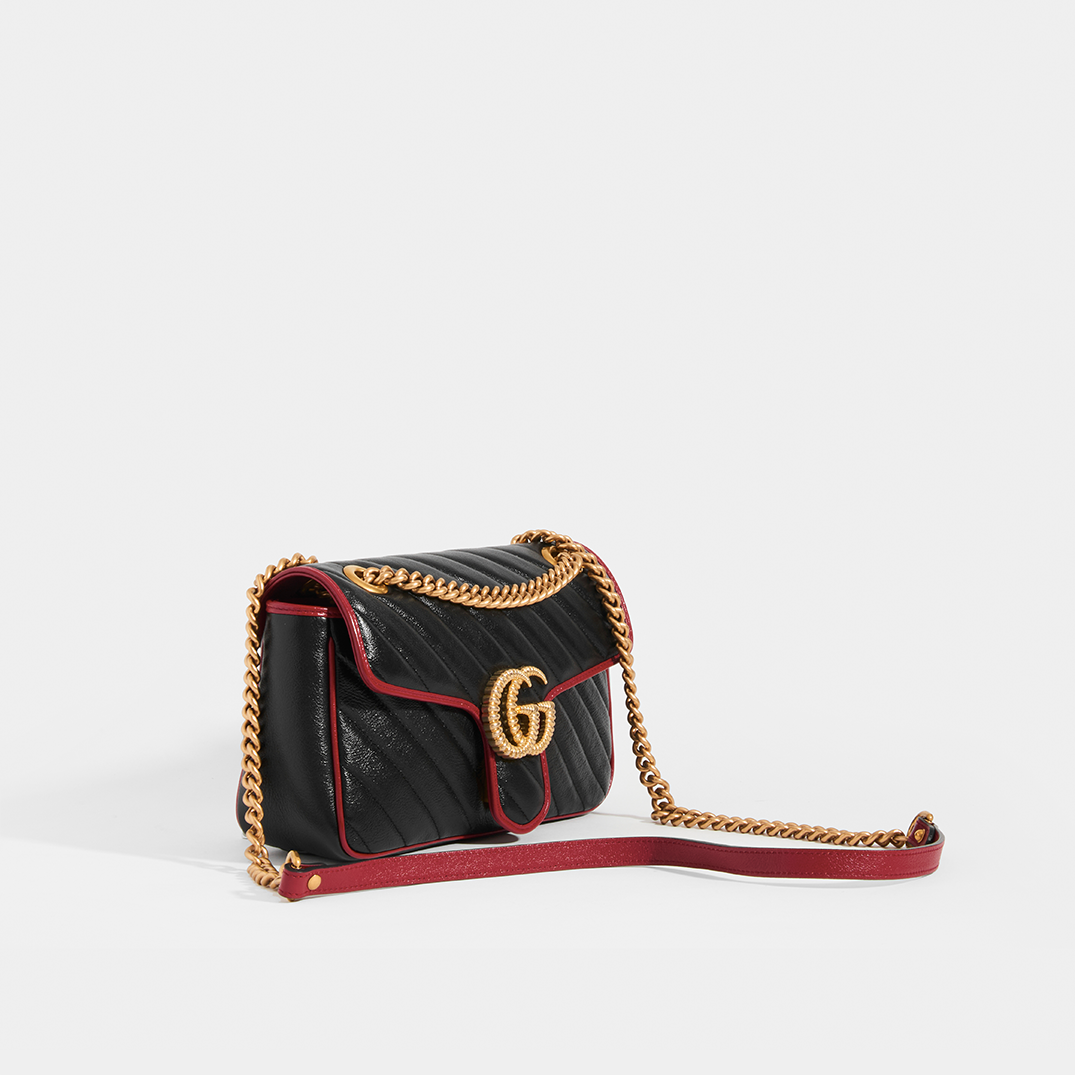 Side view of Gucci Marmont Small Shoulder Bag with Red Trim in Black Chevron Leather