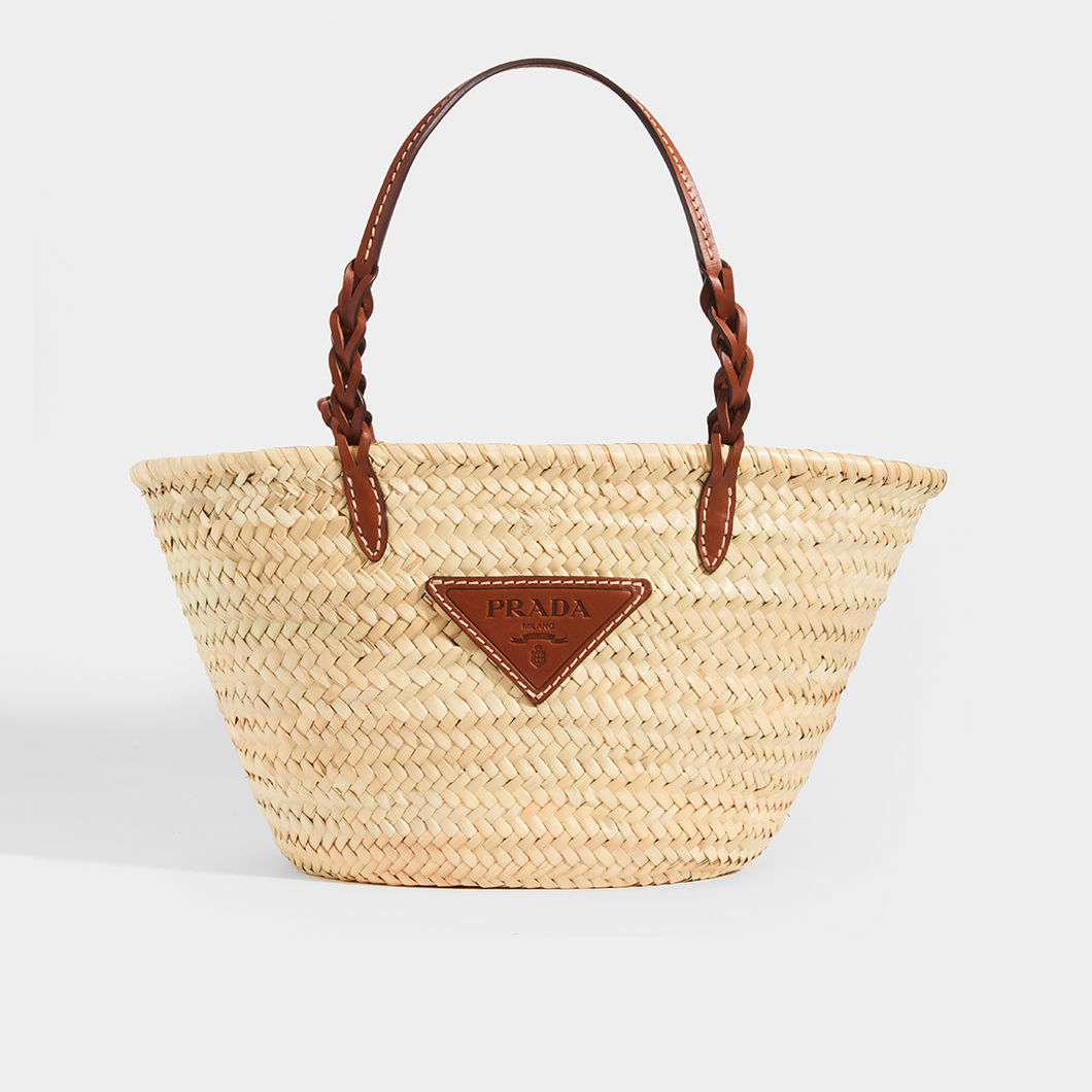 Front view of Prada natural fibre and brown leather detailing basket bag.