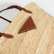 Load image into Gallery viewer, Logo view of Prada natural fibre and brown leather detailing basket bag.