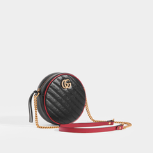 Load image into Gallery viewer, Side view of Gucci GG Marmont Mini Round Shouder Bag in Black Leather with Red Trim and Gold chain strap