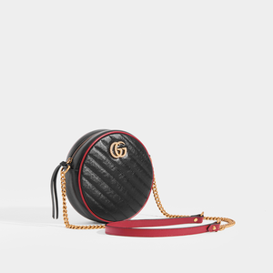 Side view of Gucci GG Marmont Mini Round Shouder Bag in Black Leather with Red Trim and Gold chain strap