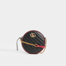 Load image into Gallery viewer, Front view of Gucci GG Marmont Mini Round Shouder Bag in Black Leather with Red Trim and Gold chain strap