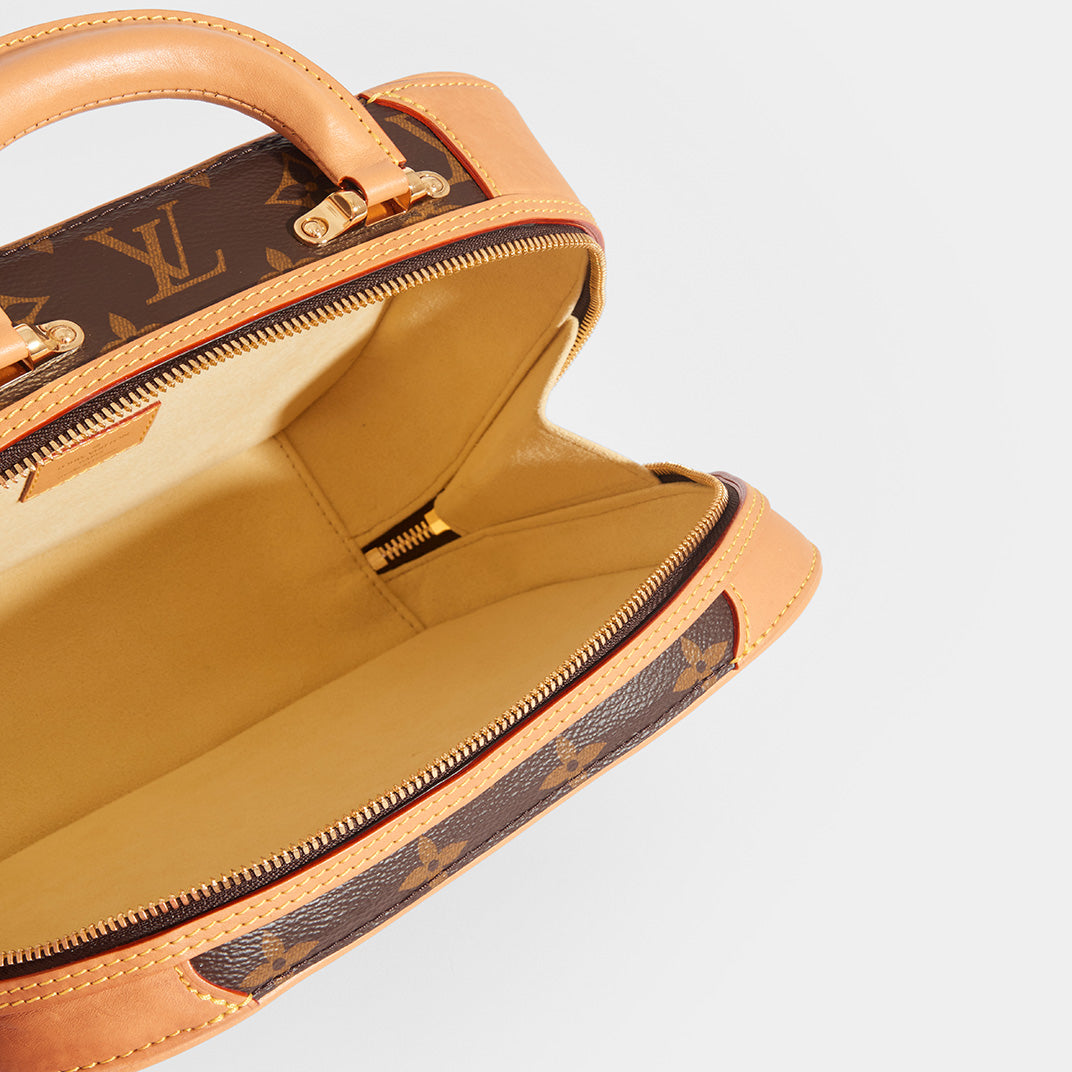 Inside view of LOUIS VUITTON Monogram Valisette PM Top Handle Bag in Brown