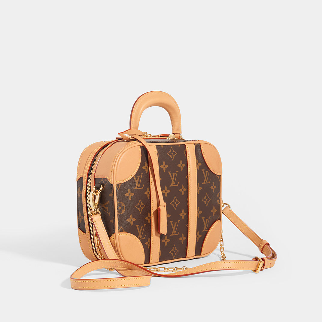 Side view of LOUIS VUITTON Monogram Valisette PM Top Handle Bag in Brown With Shoulder Strap