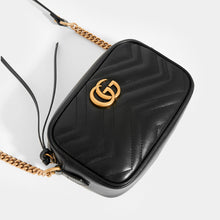 Load image into Gallery viewer, Gold GG Logo Detail on the GUCCI GG Marmont Matelasse Mini Crossbody in Black Leather With Gold Metal Chain Crossbody Strap