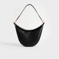 Back view of Loewe Luna shoulder bag in black leather and gold hardware.