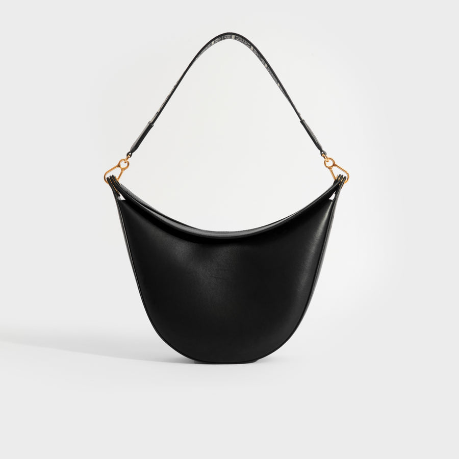 Back view of Loewe Luna shoulder bag in black leather and gold hardware.