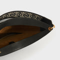 Inside view of Loewe Luna leather shoulder bag in black leather and beige suede lining. 