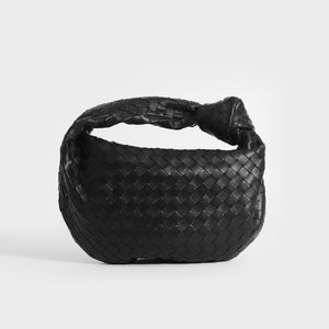 Back view of Bottega Veneta Jodie intercciato black leather bag with knotted shoulder strap