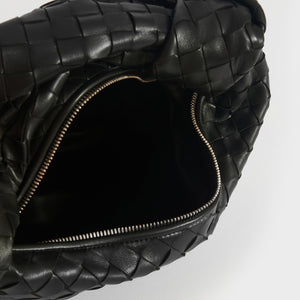 Inside view of Bottega Veneta Jodie Intercciato knotted leather shoulder bag with silver zip.