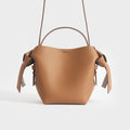 Musubi Mini Knotted Leather Crossbody Bag in Tan