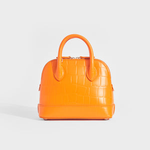 Back view of Balenciaga XXS ville embossed leather tote in orange