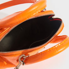 Load image into Gallery viewer, Inside view of Balenciaga XXS ville embossed leather tote in orange