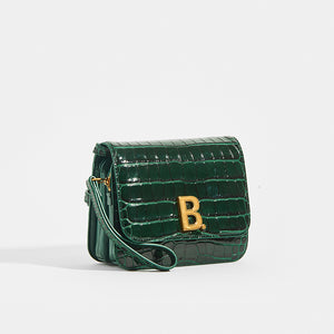 Side view of BALENCIAGA B Small Bag in Croc-Embossed Calfskin in Dark Green