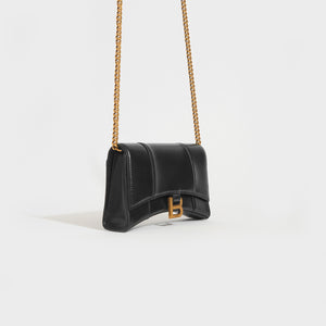 Side view of the BALENCIAGA Hourglass Chain Bag in Black